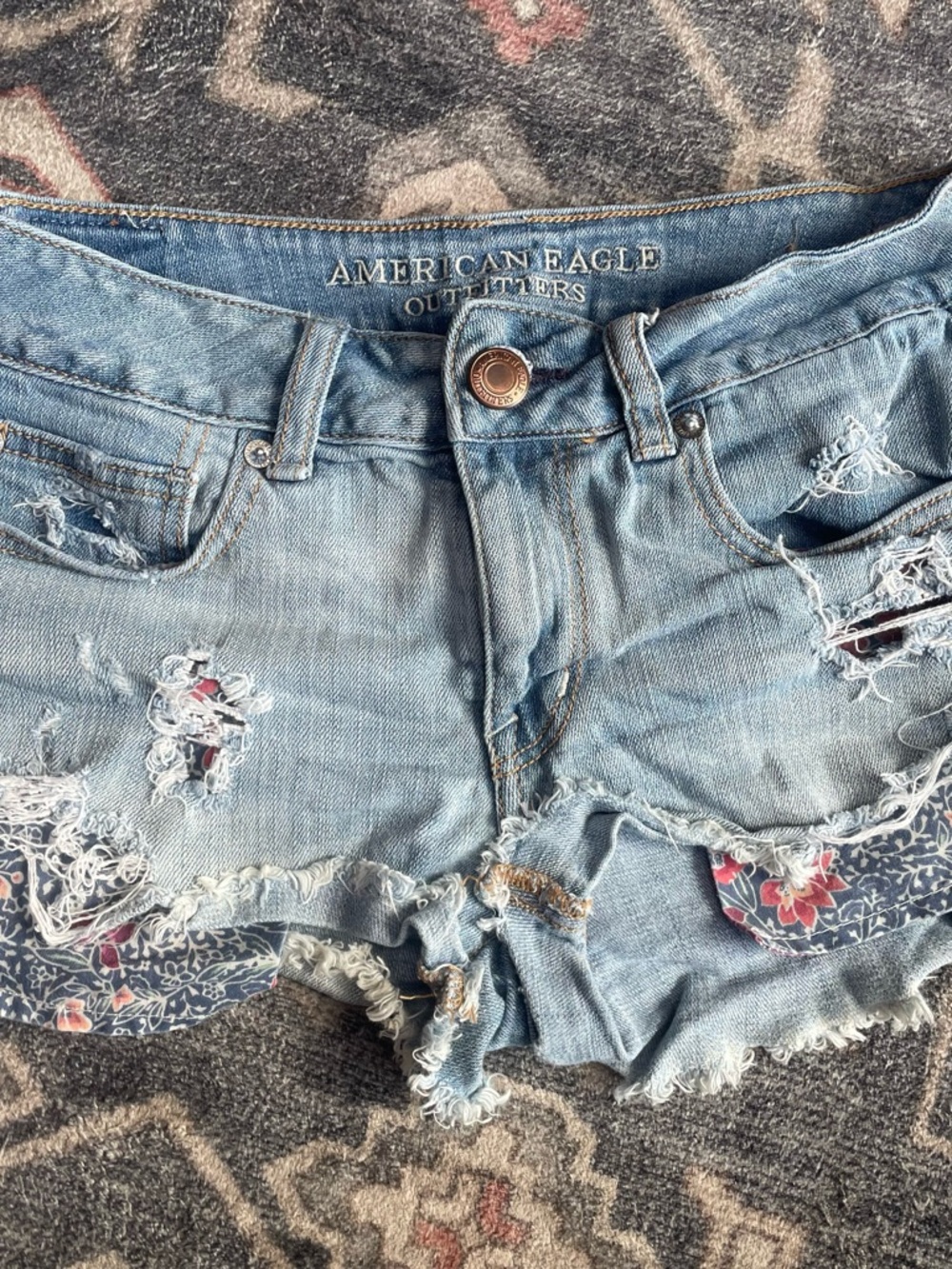 American Eagle Outfitters Light Blue Distressed Denim Shorts with Floral Insets